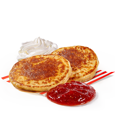 Pancakes 2 szt. z sosem truskawkowym i bitą śmietaną