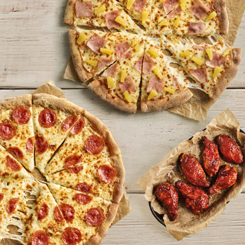 #EgyüttaCsalád menü - 2 közepes pizza + Csirkeszárnyak (3 db) - sprawdź w Pizza Hut